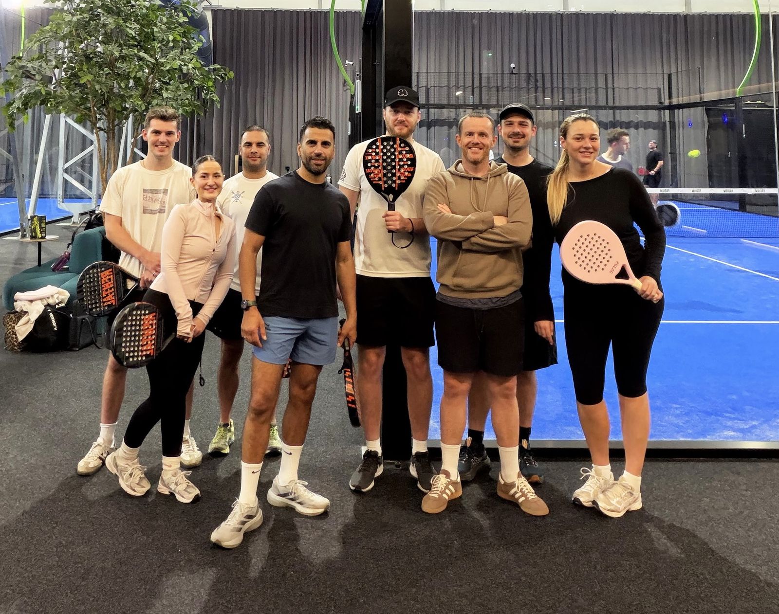 The REALM team at padel